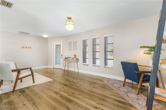 1424 SW 49th St, Cape Coral, FL 33914 - office space featuring light wood-style floors and baseboards