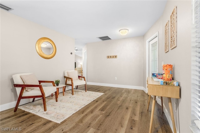 1424 SW 49th St, Cape Coral, FL 33914 - sitting room with wood finished floors and baseboards