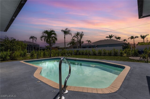 1424 SW 49th St, Cape Coral, FL 33914 - view of swimming pool with a fenced backyard and a patio