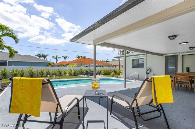 1424 SW 49th St, Cape Coral, FL 33914 - view of pool with a patio and outdoor dining area