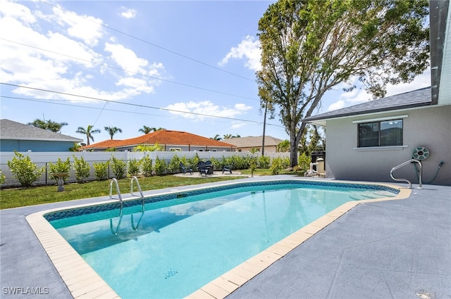 1424 SW 49th St, Cape Coral, FL 33914 - view of swimming pool featuring a patio area