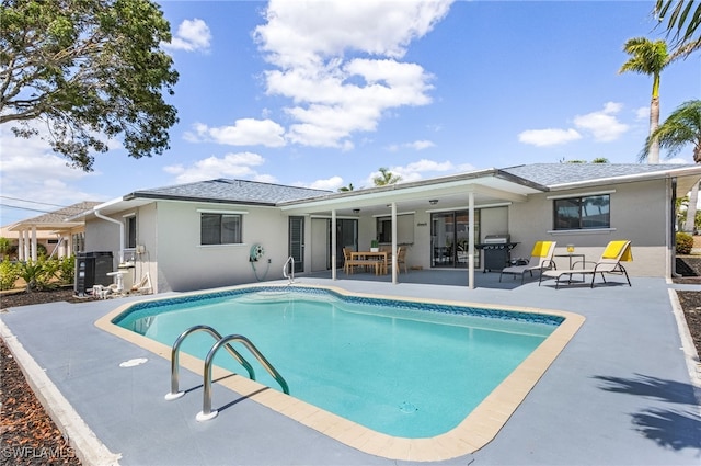1424 SW 49th St, Cape Coral, FL 33914 - swimming pool with a patio area and a grill