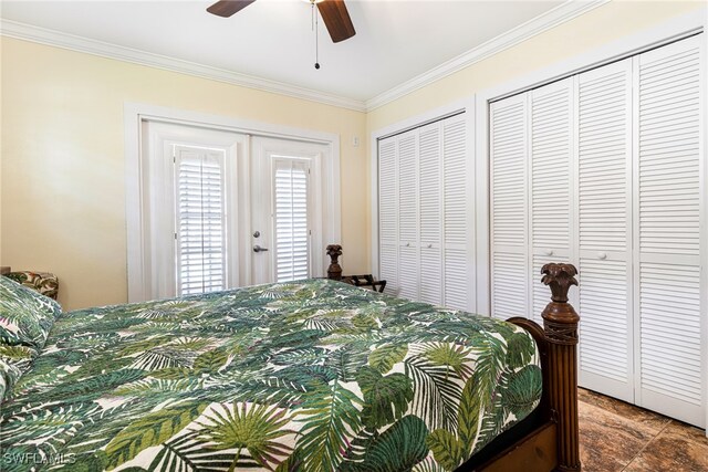 5122 Santa Rosa Ct, Cape Coral, FL 33904 - bedroom with ornamental molding, a ceiling fan, and two closets