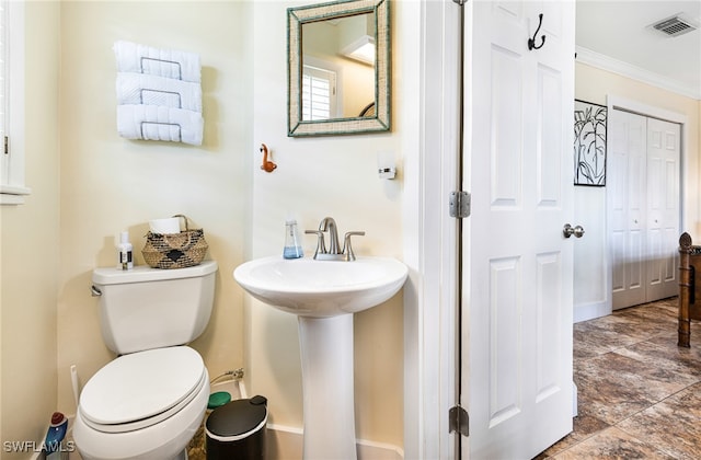 5122 Santa Rosa Ct, Cape Coral, FL 33904 - half bath featuring toilet, visible vents, ornamental molding, and a sink