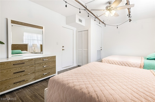 5122 Santa Rosa Ct, Cape Coral, FL 33904 - bedroom with visible vents, dark wood-style flooring, and ceiling fan