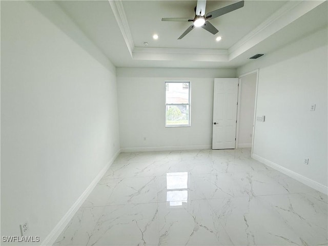 2703 42nd St SW, Lehigh Acres, FL 33976 - empty room featuring a raised ceiling, ceiling fan, baseboards, ornamental molding, and recessed lighting