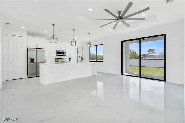 4115 20th St SW, Lehigh Acres, FL 33976 - unfurnished living room featuring recessed lighting, visible vents, and marble finish floor