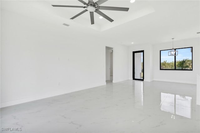 4115 20th St SW, Lehigh Acres, FL 33976 - unfurnished room with recessed lighting, visible vents, marble finish floor, and ceiling fan with notable chandelier