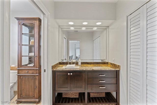 2000 Royal Marco Way Unit 607, Marco Island, FL 34145 - bathroom featuring toilet and vanity