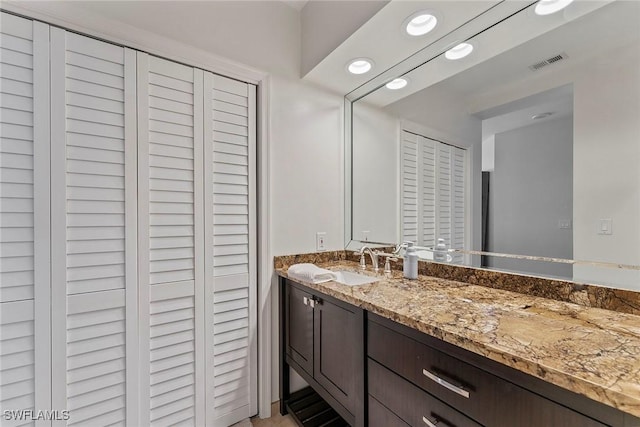 2000 Royal Marco Way Unit 607, Marco Island, FL 34145 - bathroom with vanity, a closet, and recessed lighting