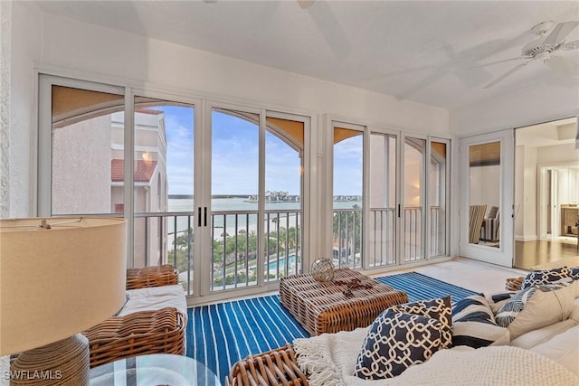 2000 Royal Marco Way Unit 607, Marco Island, FL 34145 - living area with a water view and ceiling fan