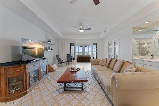2000 Royal Marco Way Unit 607, Marco Island, FL 34145 - living room with ceiling fan and a tray ceiling