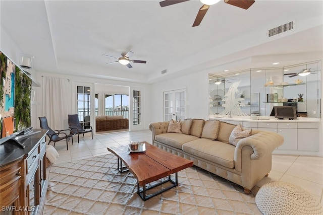 2000 Royal Marco Way Unit 607, Marco Island, FL 34145 - living area with ceiling fan, a tray ceiling, and light tile patterned floors