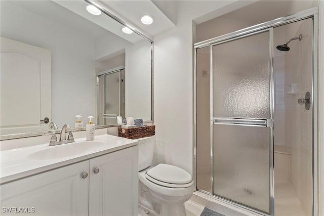 2000 Royal Marco Way Unit 607, Marco Island, FL 34145 - full bath featuring a stall shower, toilet, vanity, and tile patterned flooring