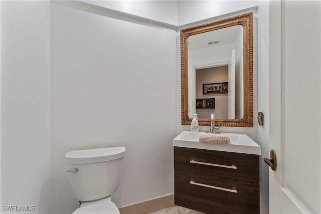 2000 Royal Marco Way Unit 607, Marco Island, FL 34145 - half bath with toilet, vanity, and baseboards
