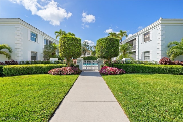 360 10th Ave S Unit B200, Naples, FL 34102 - view of property's community featuring a lawn