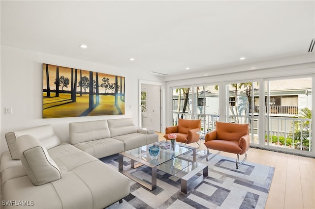 360 10th Ave S Unit B200, Naples, FL 34102 - living room featuring french doors, recessed lighting, wood finished floors, and visible vents