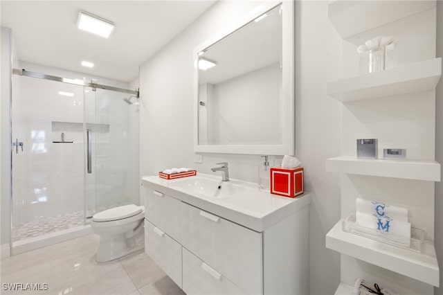 360 10th Ave S Unit B200, Naples, FL 34102 - bathroom with vanity, a stall shower, and toilet