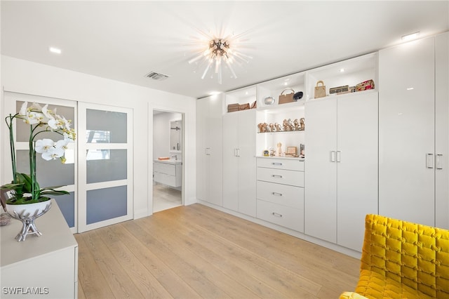 360 10th Ave S Unit B200, Naples, FL 34102 - interior space with visible vents and light wood finished floors