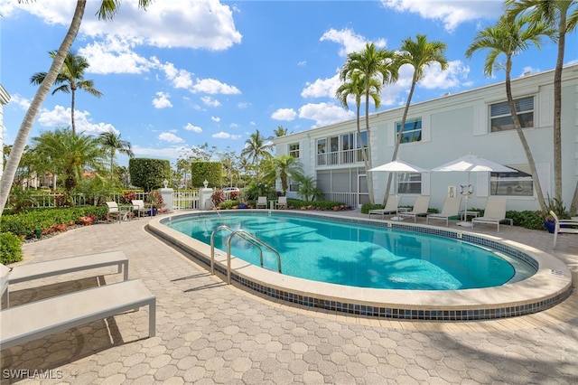 360 10th Ave S Unit B200, Naples, FL 34102 - outdoor pool featuring fence and a patio