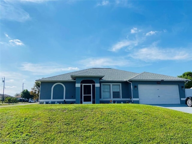 ranch-style home with an attached garage, stucco siding, and a front yard