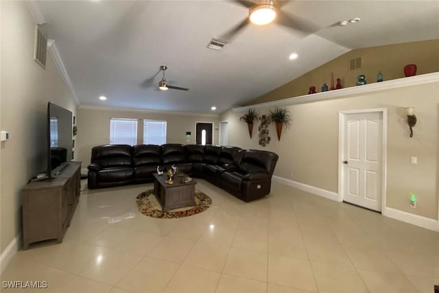 living room featuring a ceiling fan, lofted ceiling, baseboards, crown molding, and light tile patterned floors