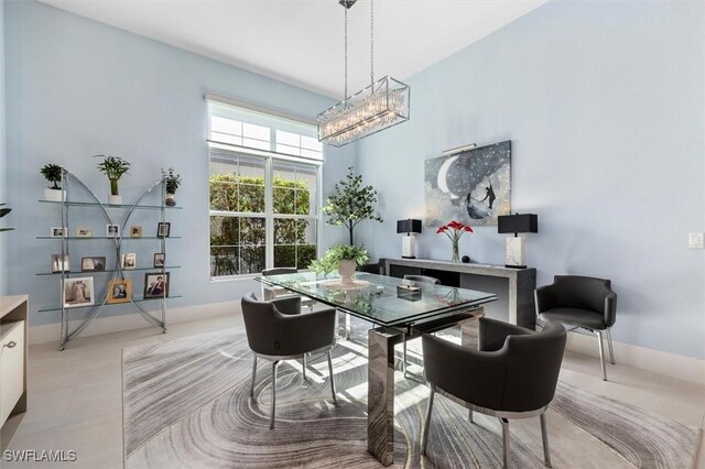 dining area featuring a chandelier