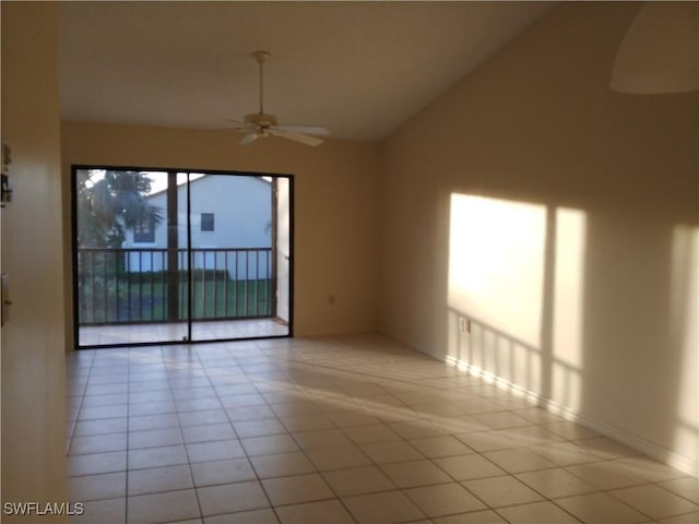 9265 Lake Park Dr Unit 201, Fort Myers, FL 33919 - unfurnished room with ceiling fan, light tile patterned floors, and lofted ceiling