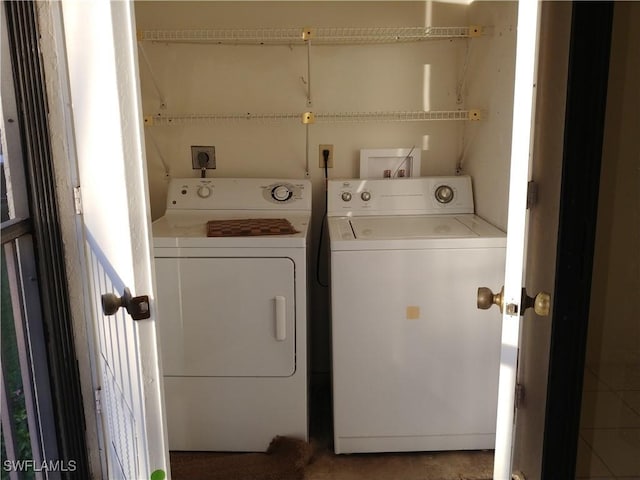 9265 Lake Park Dr Unit 201, Fort Myers, FL 33919 - laundry room with separate washer and dryer and laundry area