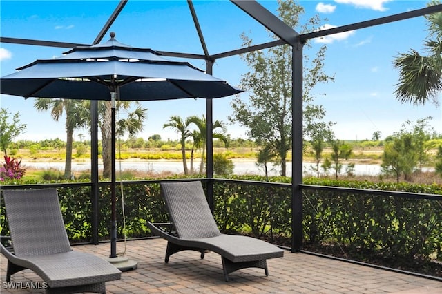 17186 Ashcomb Way, Estero, FL 33928 - view of patio featuring a water view and glass enclosure