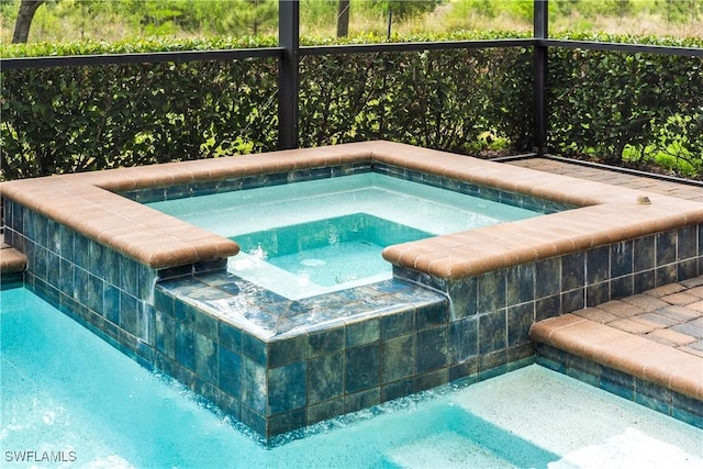 17186 Ashcomb Way, Estero, FL 33928 - view of pool with an in-ground hot tub and a pool