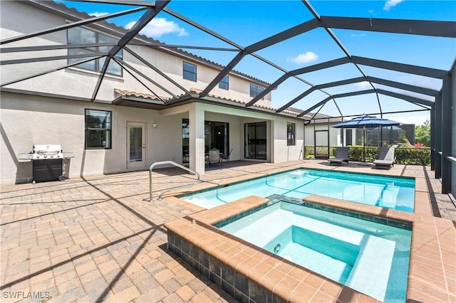 17186 Ashcomb Way, Estero, FL 33928 - view of pool featuring a patio, a pool with connected hot tub, a grill, and glass enclosure