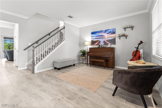 17186 Ashcomb Way, Estero, FL 33928 - living area featuring ornamental molding, stairs, and baseboards