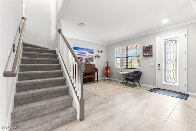 17186 Ashcomb Way, Estero, FL 33928 - entryway with stairway, crown molding, baseboards, and light tile patterned floors