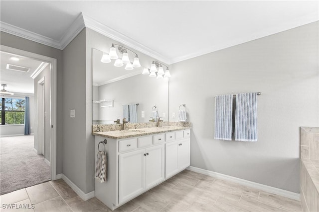 17186 Ashcomb Way, Estero, FL 33928 - bathroom featuring double vanity, ornamental molding, and baseboards
