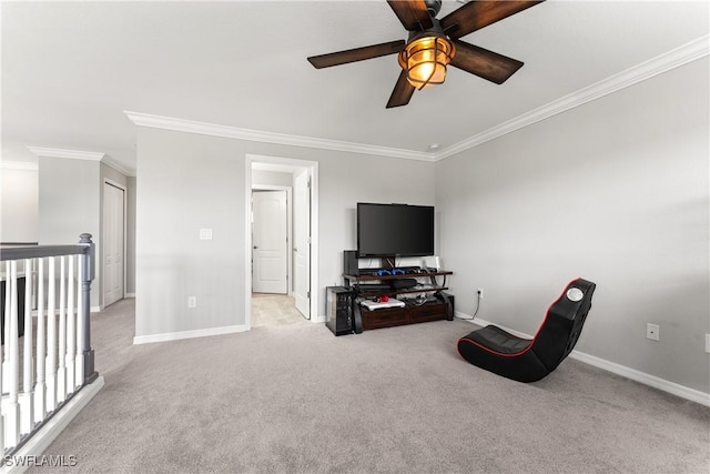 17186 Ashcomb Way, Estero, FL 33928 - sitting room featuring ornamental molding, ceiling fan, baseboards, light colored carpet, and an upstairs landing