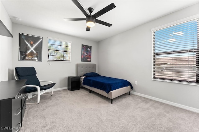 17186 Ashcomb Way, Estero, FL 33928 - bedroom with light colored carpet, baseboards, and ceiling fan