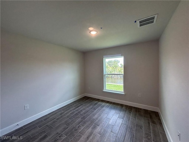 411 Paramaribo St, Punta Gorda, FL 33983 - spare room with dark wood finished floors