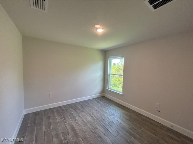 411 Paramaribo St, Punta Gorda, FL 33983 - unfurnished room with dark wood finished floors and recessed lighting