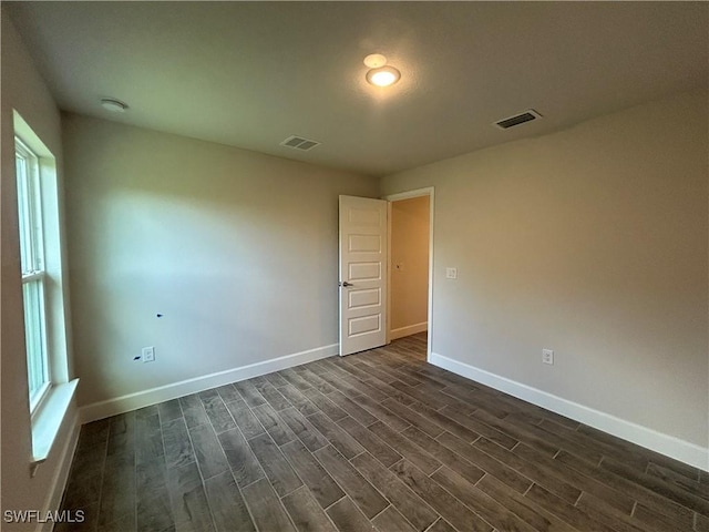 411 Paramaribo St, Punta Gorda, FL 33983 - empty room featuring dark wood-type flooring