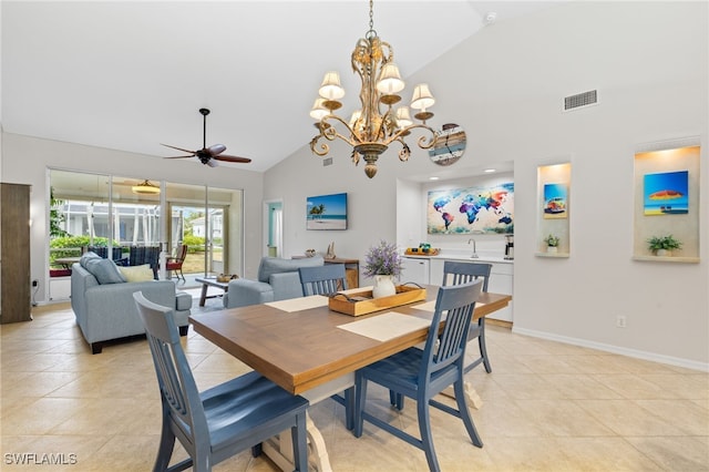 dining room with high vaulted ceiling, ceiling fan with notable chandelier, baseboards, light tile patterned floors, and visible vents