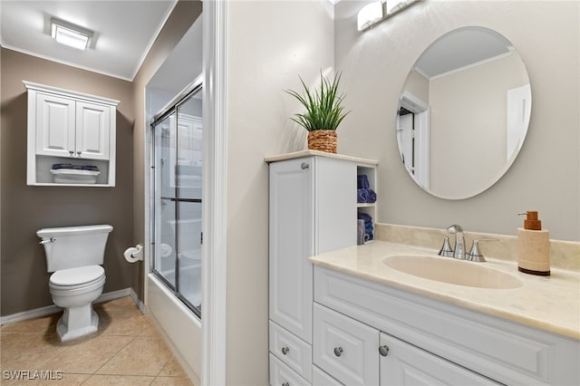 bathroom with crown molding, shower / bath combination with glass door, vanity, toilet, and tile patterned floors