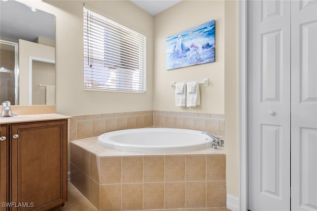 9280 Triana Ter Unit 234, Fort Myers, FL 33912 - full bath with a garden tub, vanity, and a closet