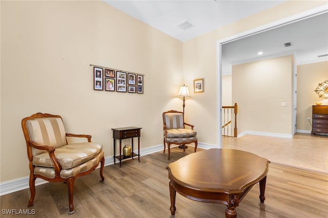9280 Triana Ter Unit 234, Fort Myers, FL 33912 - living area featuring an upstairs landing, baseboards, light wood finished floors, and recessed lighting