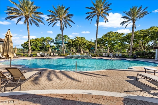 9280 Triana Ter Unit 234, Fort Myers, FL 33912 - community pool featuring fence and a patio