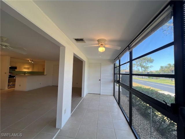 8080 S Woods Cir Unit 11, Fort Myers, FL 33919 - unfurnished sunroom with visible vents and a ceiling fan