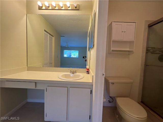 8080 S Woods Cir Unit 11, Fort Myers, FL 33919 - full bath featuring vanity, baseboards, toilet, and a shower stall