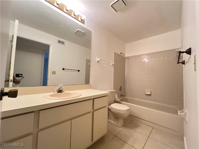 8080 S Woods Cir Unit 11, Fort Myers, FL 33919 - bathroom featuring shower / tub combination, tile patterned flooring, vanity, toilet, and visible vents