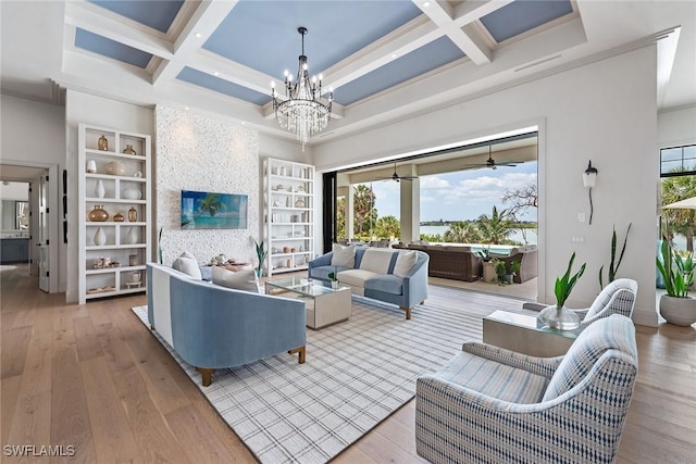 1247 Blue Hill Creek Dr, Marco Island, FL 34145 - living area with coffered ceiling, hardwood / wood-style floors, a chandelier, beamed ceiling, and ceiling fan