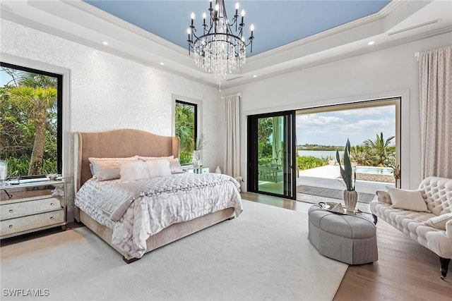 1247 Blue Hill Creek Dr, Marco Island, FL 34145 - bedroom with ornamental molding, access to exterior, a chandelier, recessed lighting, and wood finished floors